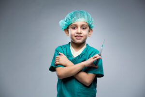 Child in scrubs